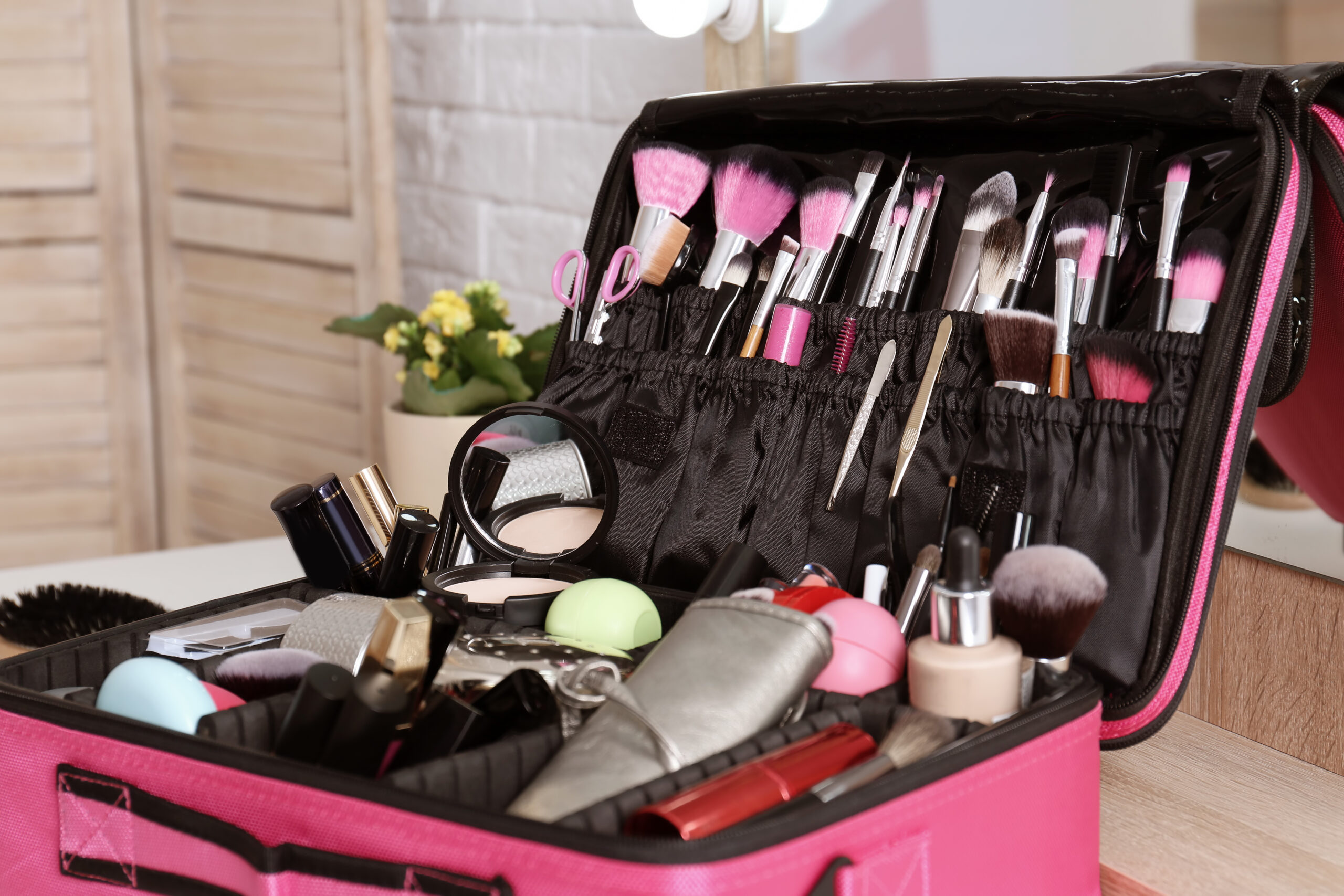 beautician,case,with,professional,makeup,products,and,tools,on,dressing